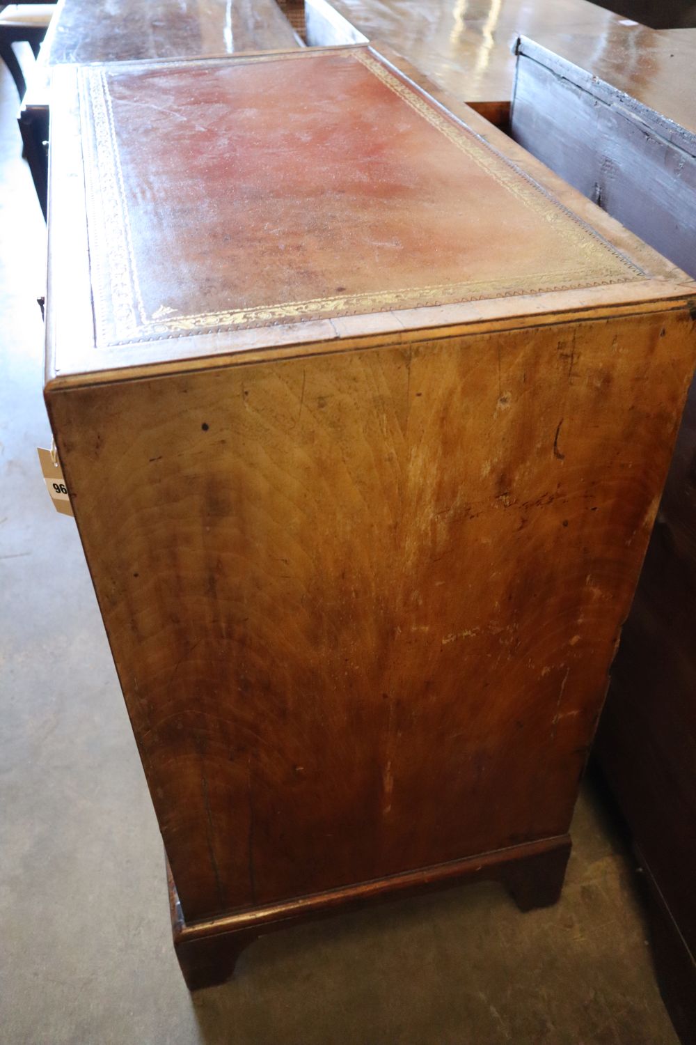 A George I walnut chest, with brushing slide, two short and three graduated long drawers, width 82cm